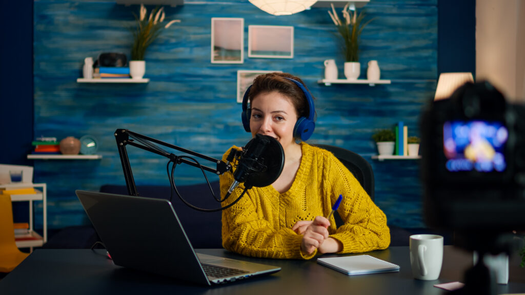 creative vlogger recording podcast using production station